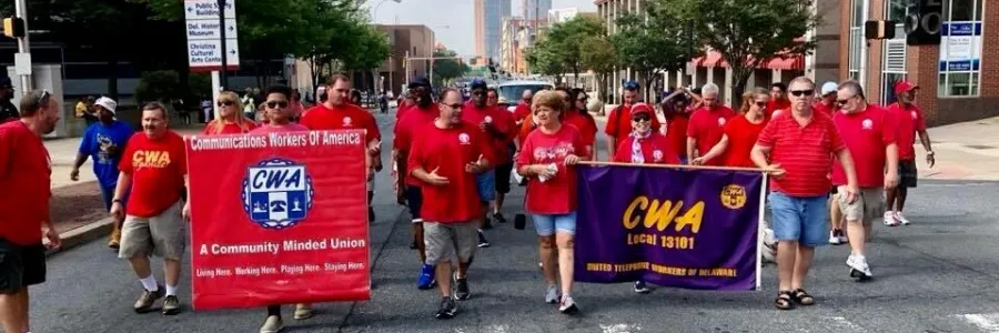 local 13101 members marching with CWA banners
